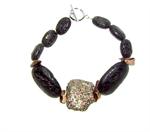 Armbånd med pyrit, lava og abelone perler.